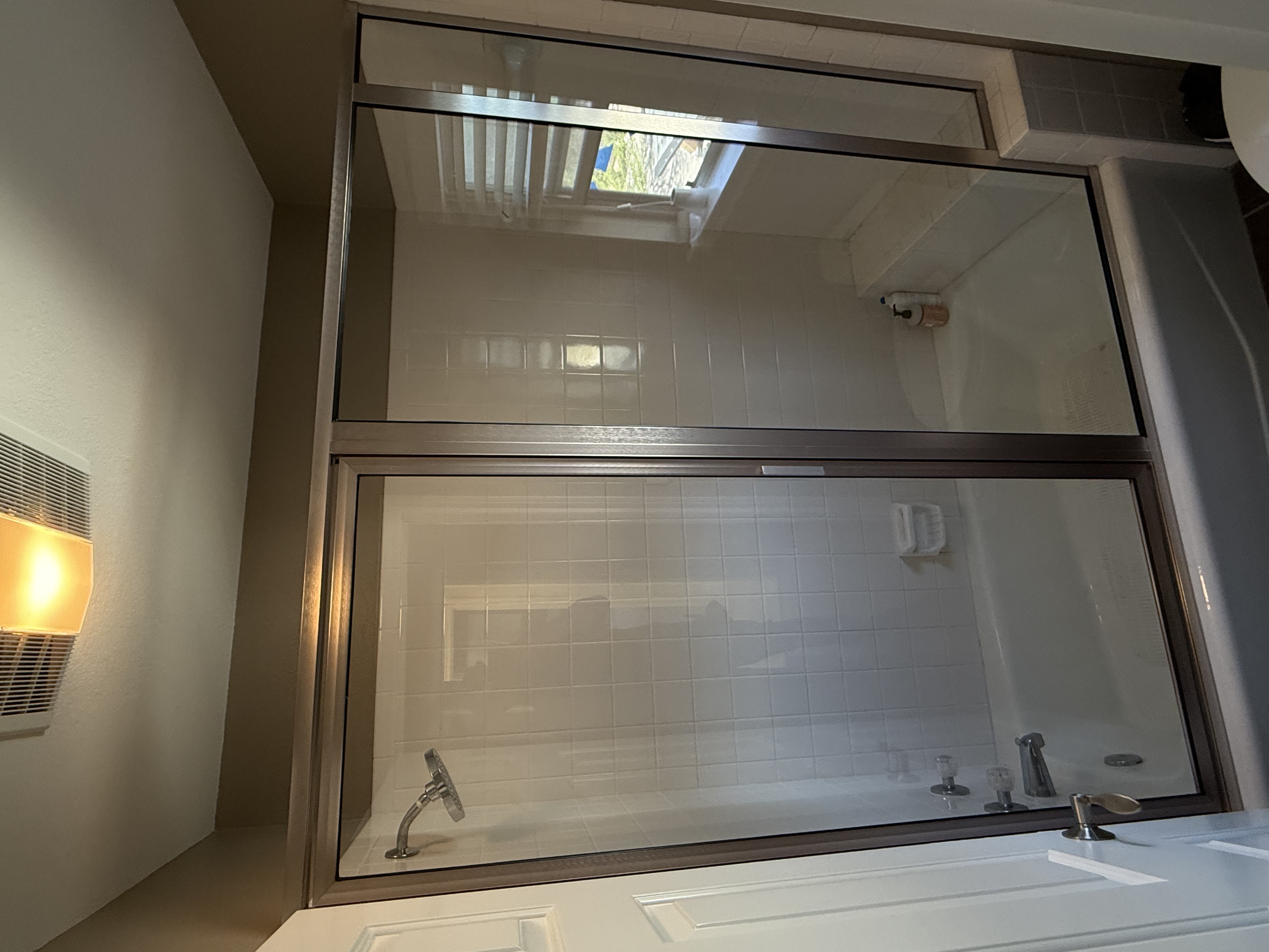 Framed shower installation