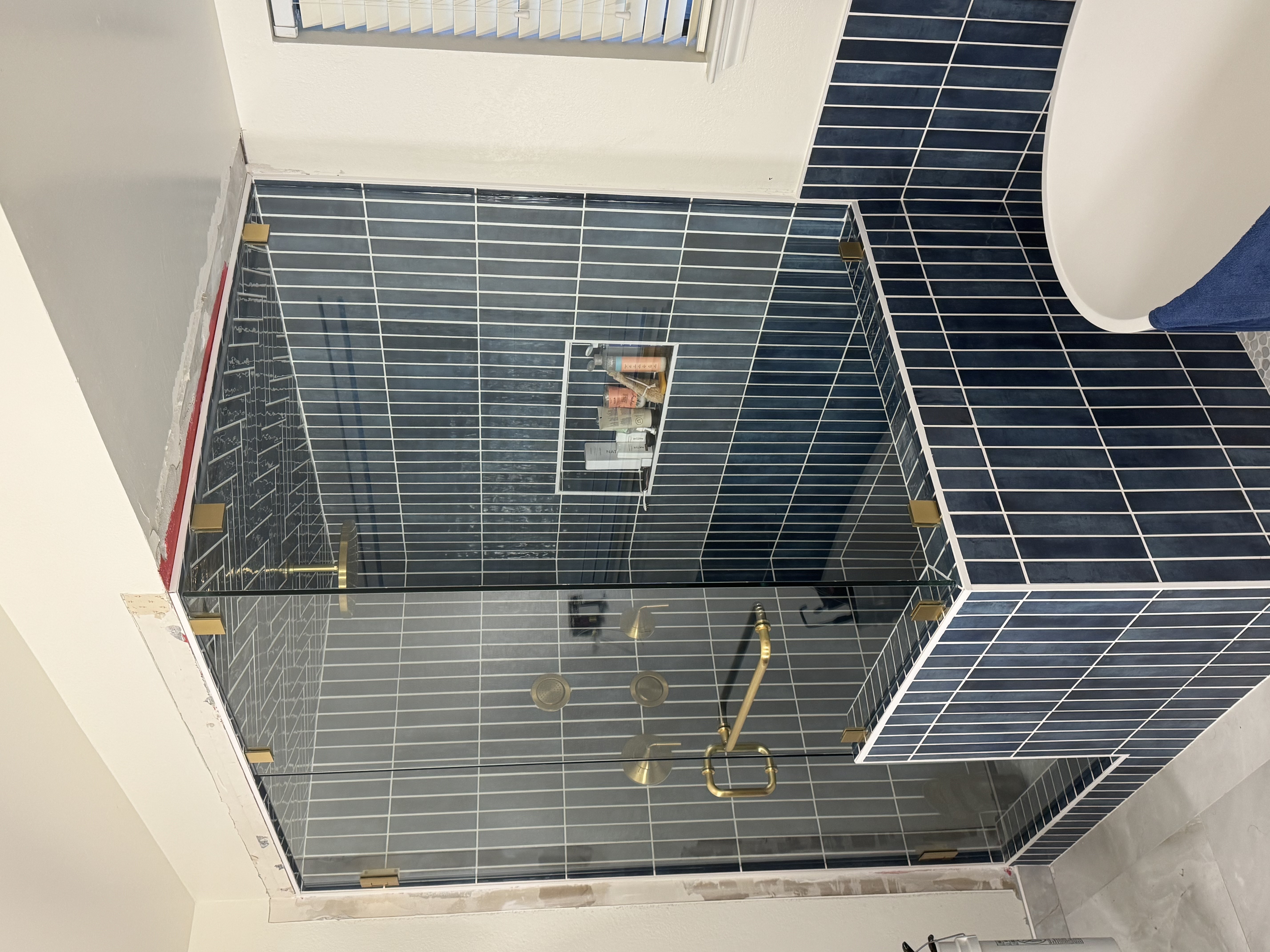 Frameless shower installation 1